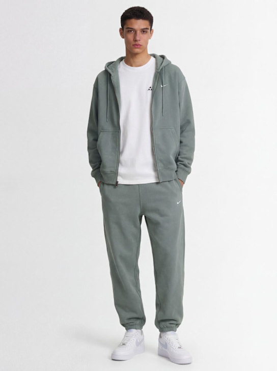 Nike: Solo Swoosh sweatpants - Clay Green/Clay - men_1 | Luisa Via Roma