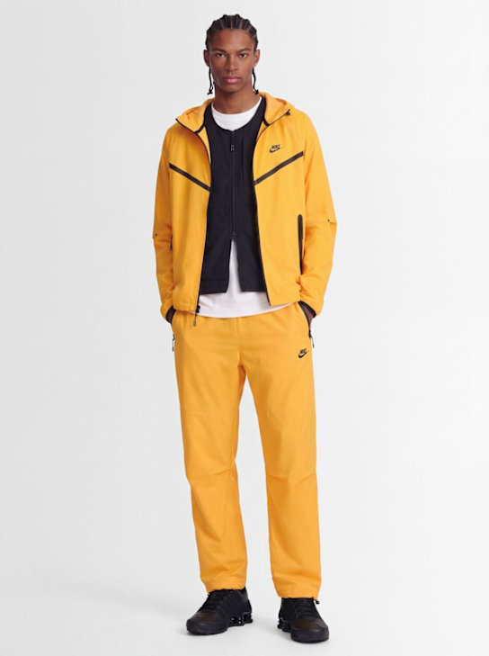 Nike: Tech pants - Yellow - men_1 | Luisa Via Roma
