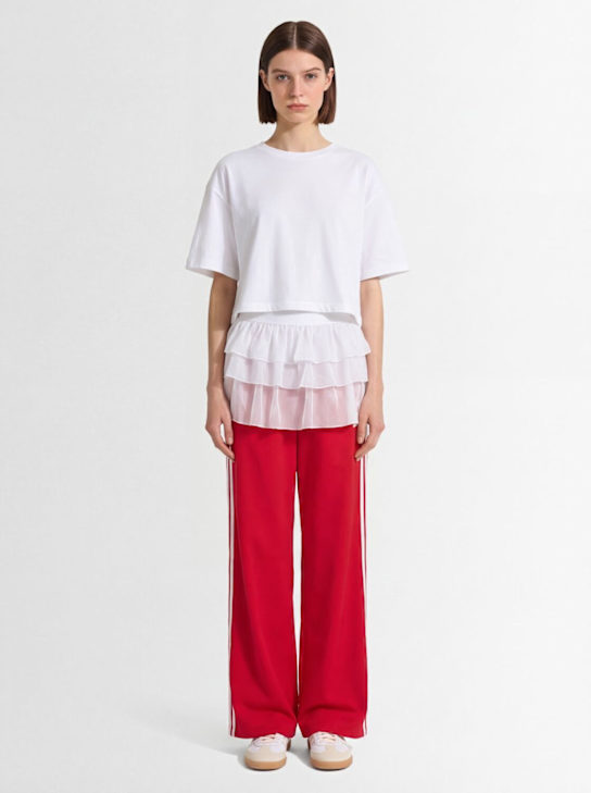adidas Originals: Adilenium Firebird track pants - Better Scarlet - women_1 | Luisa Via Roma