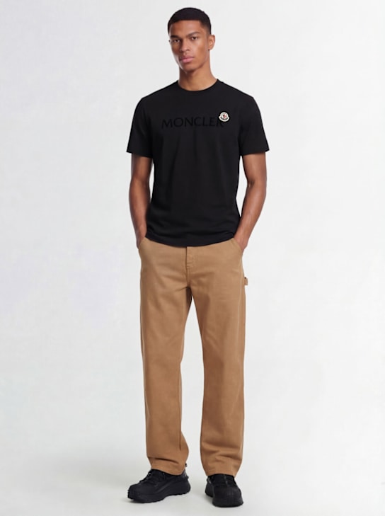 Moncler: Flocked logo cotton t-shirt - 블랙 - men_1 | Luisa Via Roma