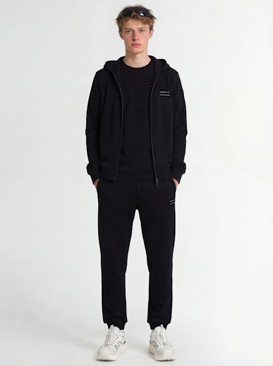 Moncler: Logo cotton fleece track pants - Black - men_1 | Luisa Via Roma