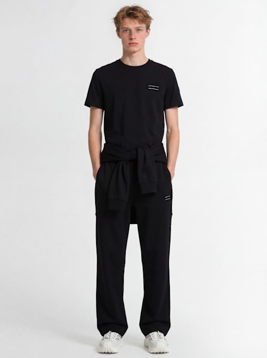 Moncler: Logo cotton jersey t-shirt - Black - men_1 | Luisa Via Roma