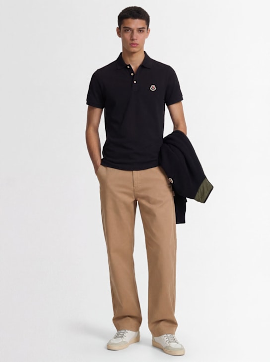 Moncler: Logo patch cotton polo shirt - 黑色 - men_1 | Luisa Via Roma