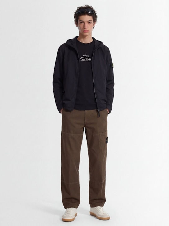 Stone Island: Logo patch nylon zip-up hooded jacket - Black - men_1 | Luisa Via Roma