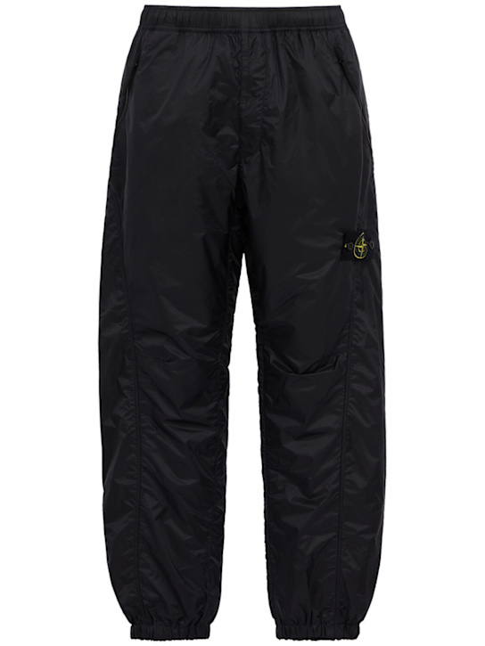 Stone Island: Logo nylon loose pants - 海军蓝 - men_0 | Luisa Via Roma