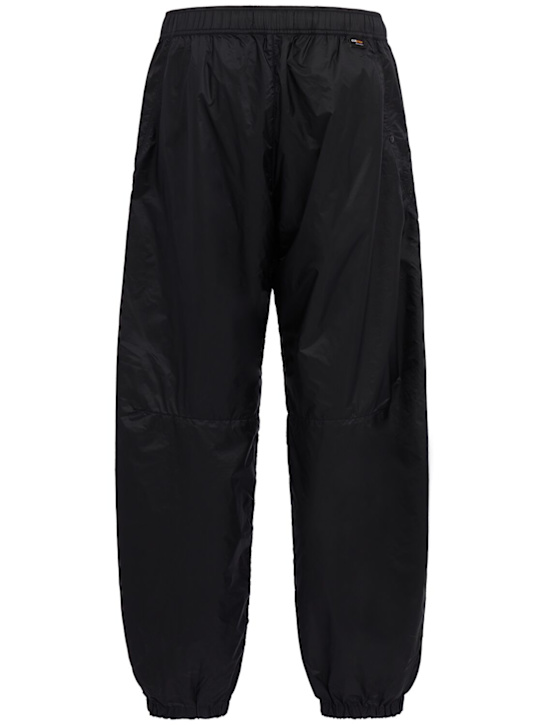 Stone Island: Logo nylon loose pants - 海军蓝 - men_1 | Luisa Via Roma