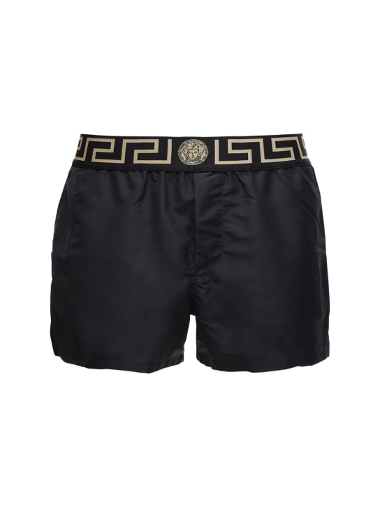 Versace: Shorts mare in techno con logo - Nero/Oro - men_0 | Luisa Via Roma