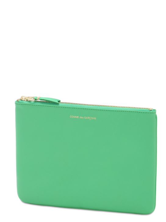 Comme des Garçons Wallet: Logo leather pouch - men_1 | Luisa Via Roma