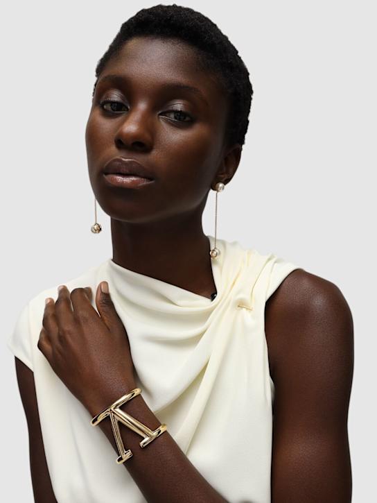 Valentino Garavani: Bracciale rigido Vlogo - Oro - women_1 | Luisa Via Roma