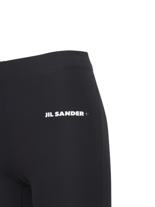 Jil Sander: Logo弹力科技平纹针织紧身裤 - 黑色 - women_1 | Luisa Via Roma