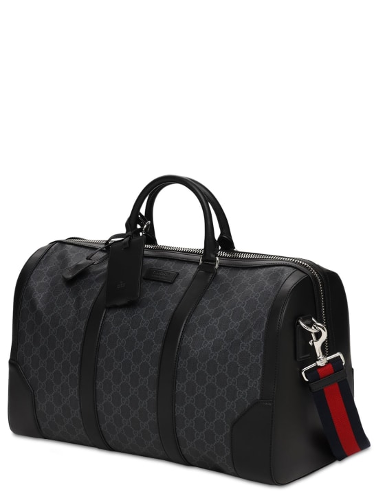 Gucci: GG Supreme coated canvas carry-on bag - Black - men_1 | Luisa Via Roma