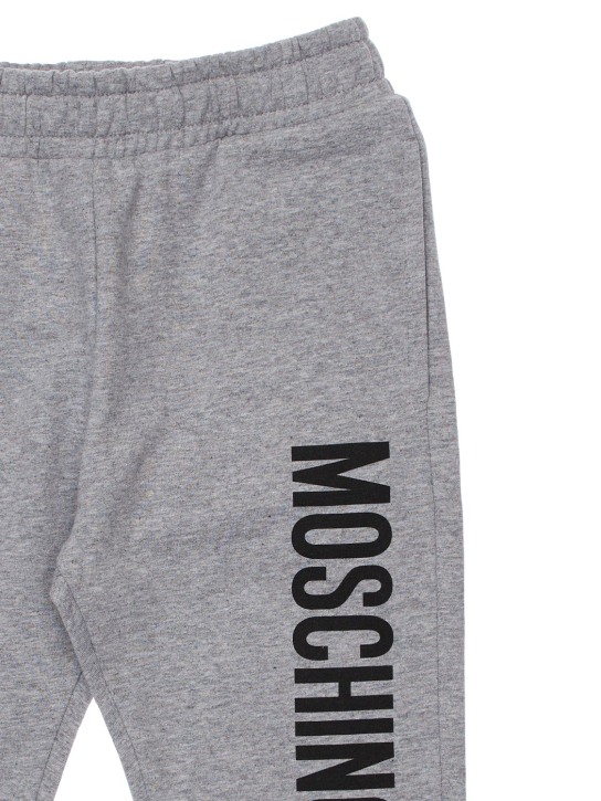 Moschino: Logo print cotton sweatpants - Grey - kids-boys_1 | Luisa Via Roma