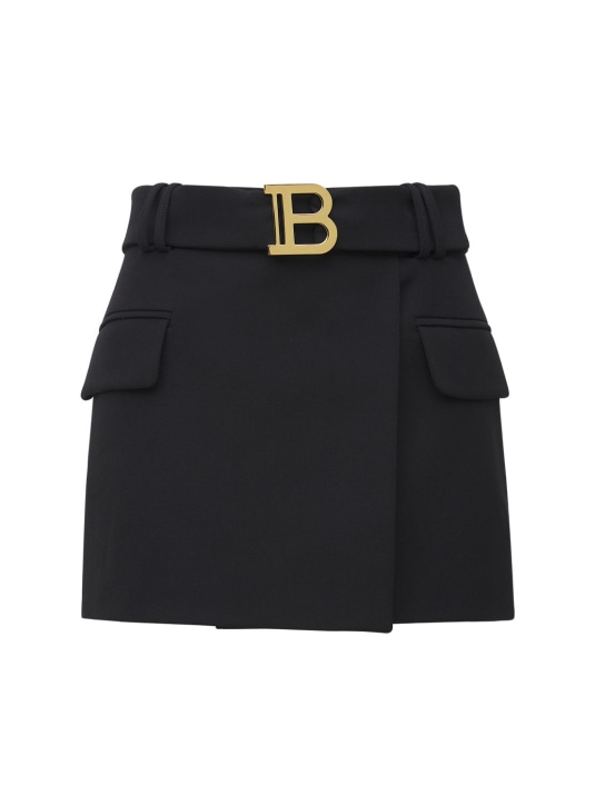 Balmain: Low rise belted logo wool mini skirt - women_0 | Luisa Via Roma