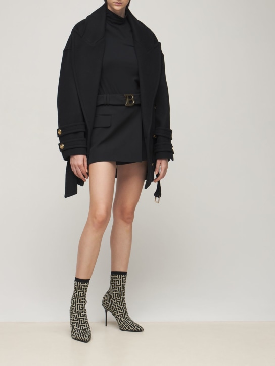 Balmain: Low rise belted logo wool mini skirt - women_1 | Luisa Via Roma