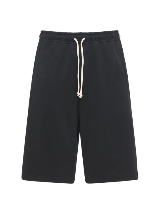 Gucci: Shorts in techno jersey con bande laterali - Nero - men_0 | Luisa Via Roma