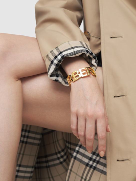 Burberry: Bracciale a fascia con logo - Oro - women_1 | Luisa Via Roma