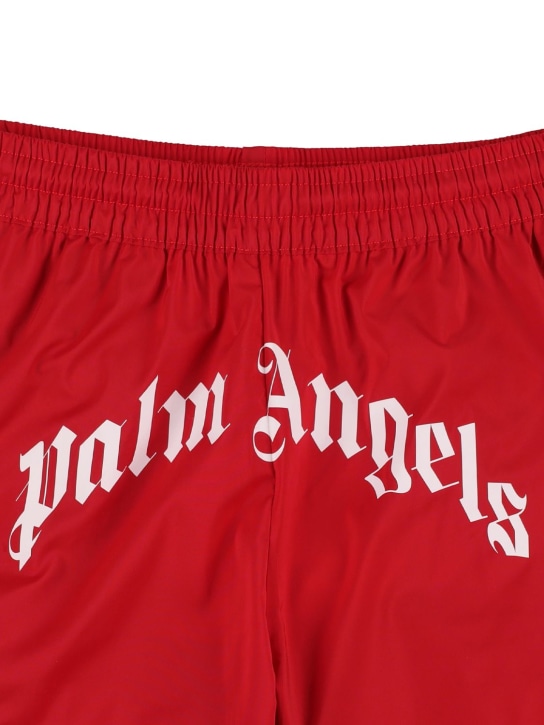 Palm Angels: Short de bain en nylon imprimé logo - Rouge - kids-boys_1 | Luisa Via Roma