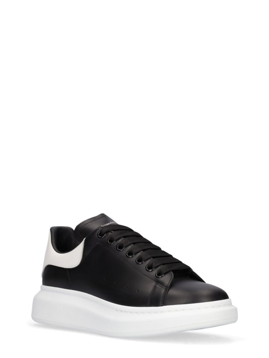 Alexander McQueen: 45mm Leather sneakers - Black/White - men_1 | Luisa Via Roma