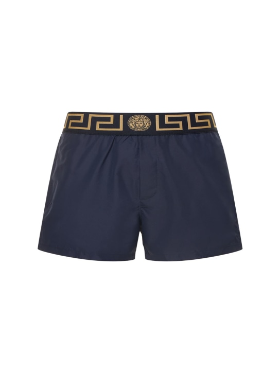 Versace: Monogram waistband tech swim shorts - Mavi/Altın - men_0 | Luisa Via Roma