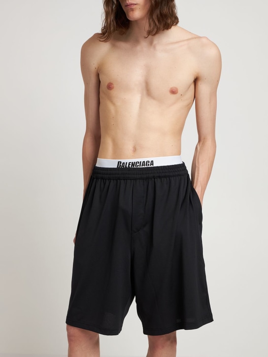 Balenciaga: Shorts mare in nylon con logo - Nero - men_1 | Luisa Via Roma