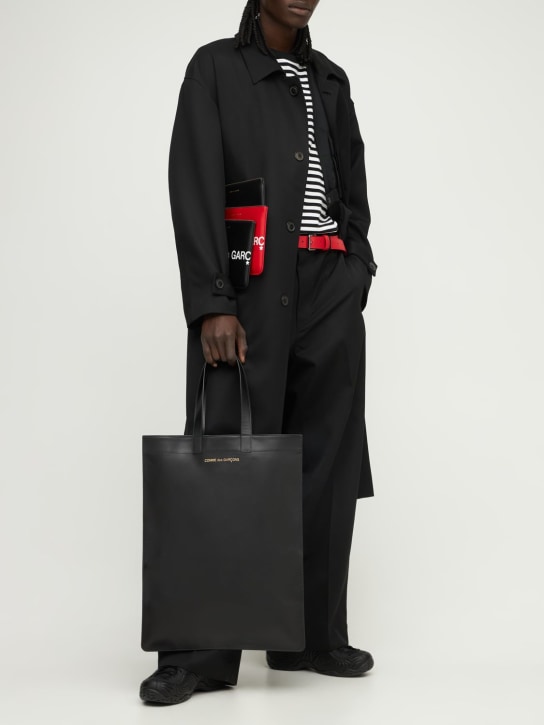 Comme des Garçons Wallet: Logo leather pouch - Black - men_1 | Luisa Via Roma