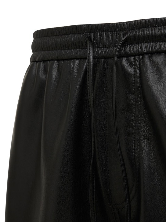 Nanushka: Faux leather sweat shorts - Siyah - men_1 | Luisa Via Roma