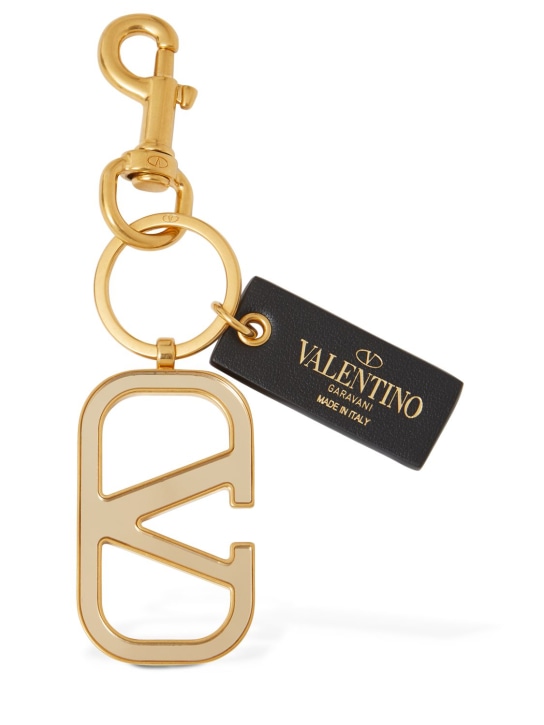 Valentino Garavani: Porte-clés en cuir V Logo - Or/Blanc - men_0 | Luisa Via Roma