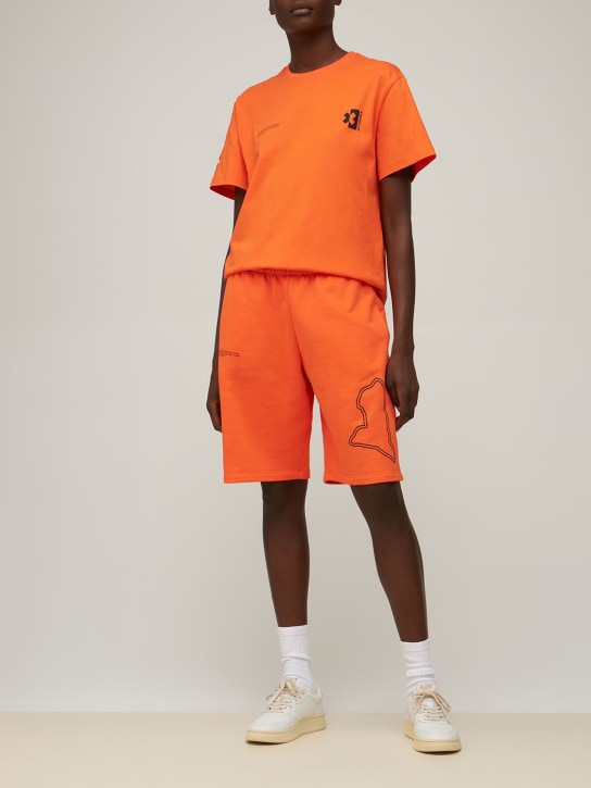 Pangaia: Shorts Pangaia x Extreme E in cotone - Arancione - women_1 | Luisa Via Roma