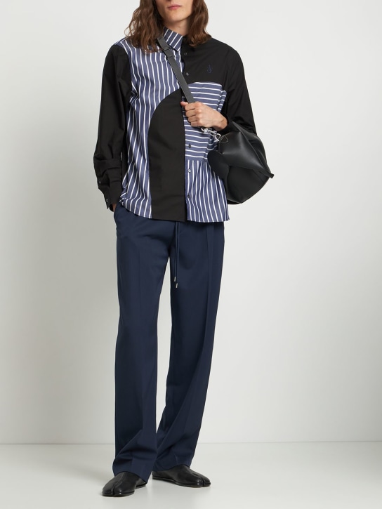 JW Anderson: Curved patchwork cotton shirt - men_1 | Luisa Via Roma