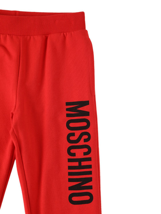 Moschino: Pantalon de jogging en coton imprimé logo - Rouge - kids-boys_1 | Luisa Via Roma