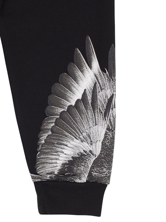 Marcelo Burlon County Of Milan: Pantaloni in felpa di misto cotone stampata - Nero - kids-boys_1 | Luisa Via Roma