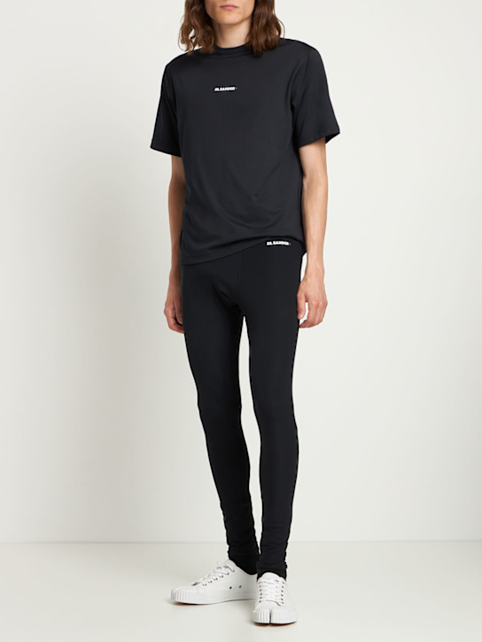 Jil Sander: Plus logo tech jersey leggings - Black - men_1 | Luisa Via Roma
