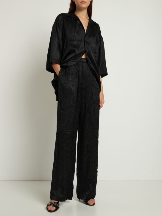 Balenciaga: Pantalon de pyjama en soie jacquard à logo - women_1 | Luisa Via Roma
