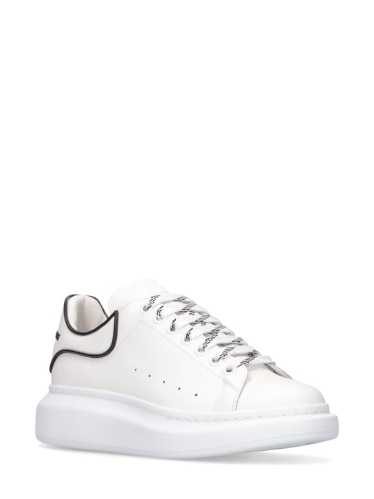 Alexander McQueen: 45mm Oversized leather sneakers - Beyaz - men_1 | Luisa Via Roma