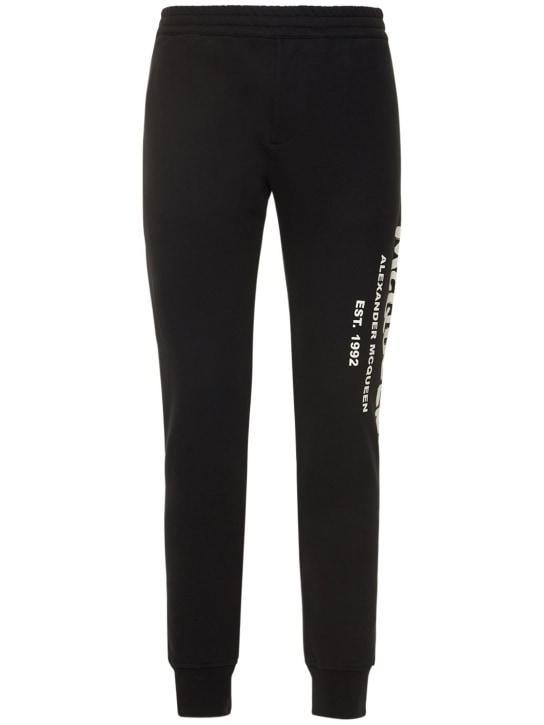 Alexander McQueen: Pantalones jogging de algodón con logo - Negro/Marfil - men_0 | Luisa Via Roma