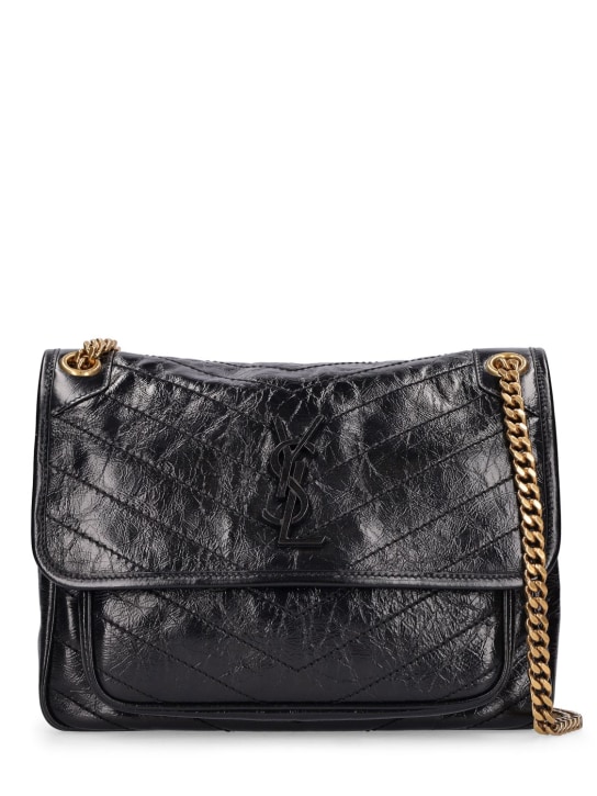 Saint Laurent: Medium Niki vintage leather shoulder bag - Black - women_0 | Luisa Via Roma