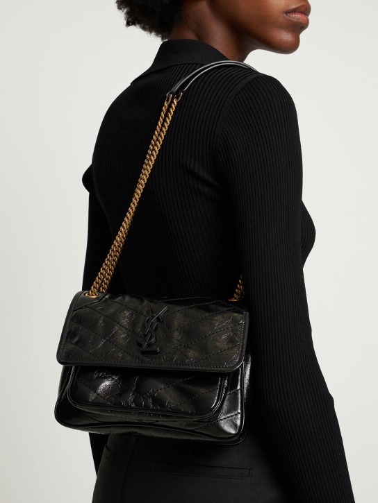 Saint Laurent: Baby Niki leather shoulder bag - Black - women_1 | Luisa Via Roma