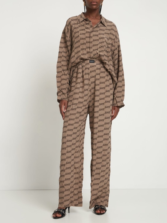 Balenciaga: Pantalones de pijama con monograma - Beige/Negro - women_1 | Luisa Via Roma