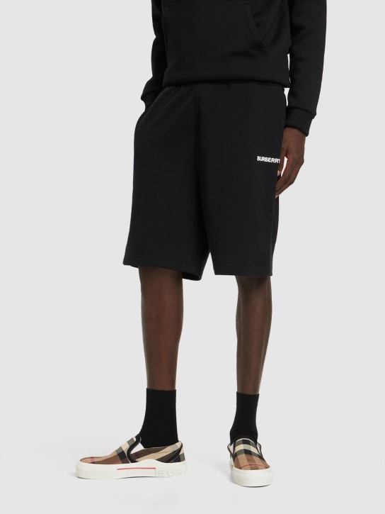 Burberry: Raphael logo cotton jersey sweat shorts - Black - men_1 | Luisa Via Roma