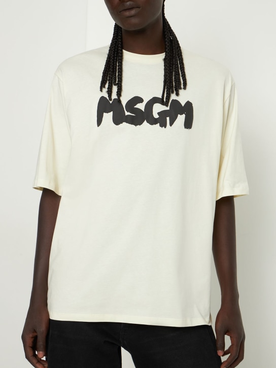 MSGM: T-shirt en jersey de coton à imprimé logo - Crème/Noir - men_1 | Luisa Via Roma