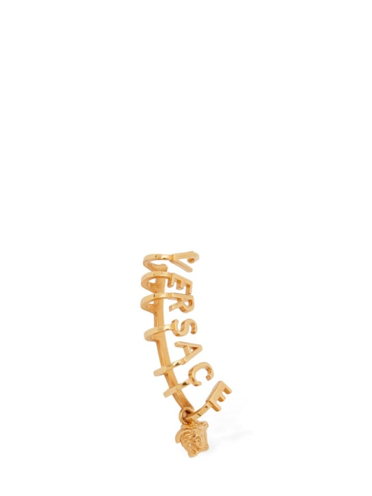 Versace: Versace lettering & medusa ear cuff - Gold - men_1 | Luisa Via Roma