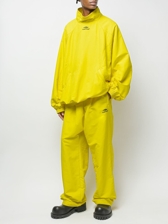 Balenciaga: Nylon pants - Citrus Yellow - men_1 | Luisa Via Roma