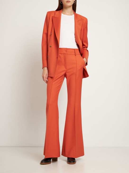 Gabriela Hearst: Rhein ウールブレンドフレアパンツ - オレンジ - women_1 | Luisa Via Roma