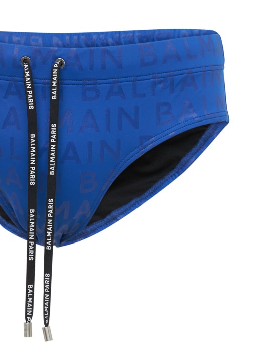 Balmain: Logo printed nylon swim briefs - men_1 | Luisa Via Roma