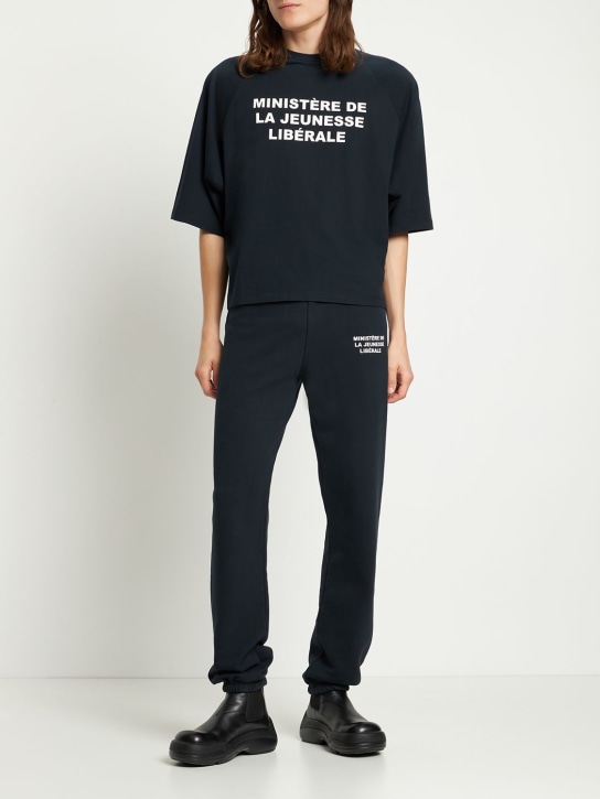 Liberal Youth Ministry: Logo detail cotton sweatpants - Black - men_1 | Luisa Via Roma