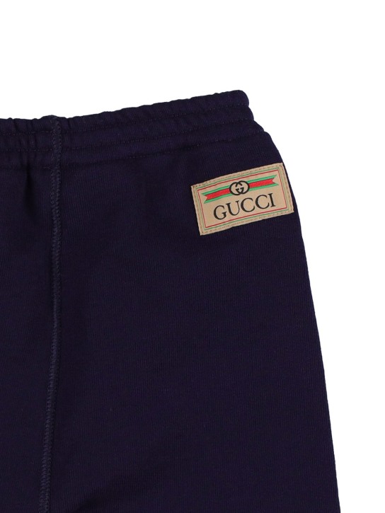 Gucci: Pantalon en coton avec patch logo - Bleu Marine - kids-boys_1 | Luisa Via Roma