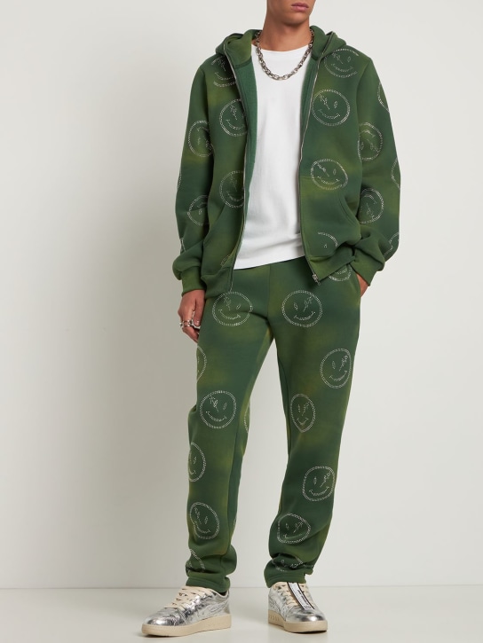 Retrovert: All over rhinestone smiley sweatpants - Green - men_1 | Luisa Via Roma