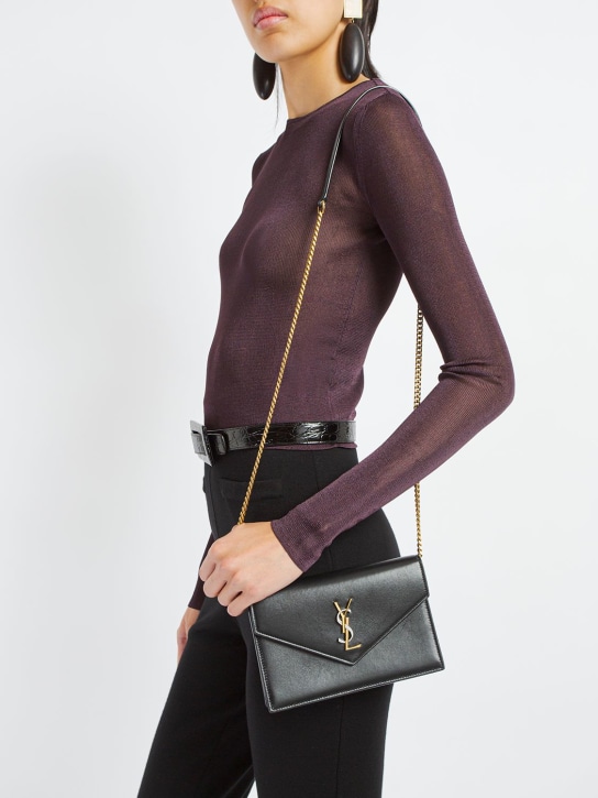 Saint Laurent: Cassandre leather envelope chain wallet - Black - women_1 | Luisa Via Roma