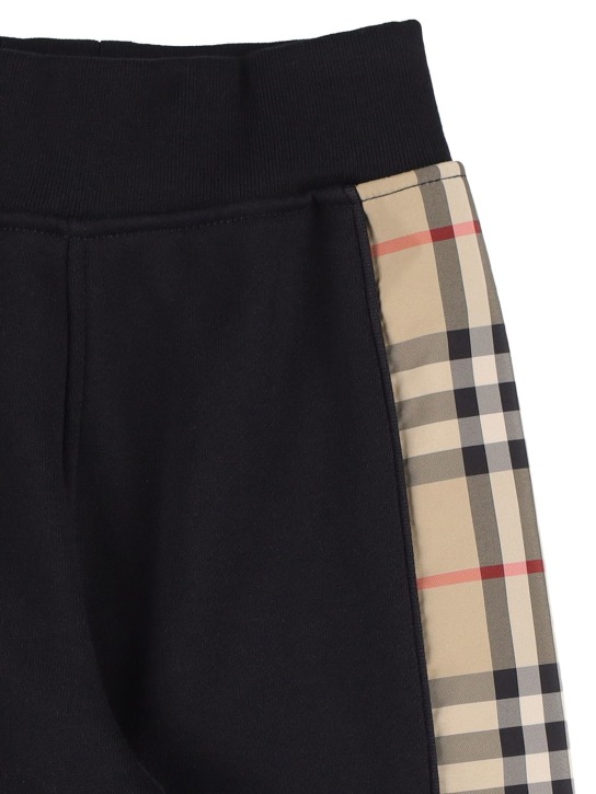 Burberry: Pantaloni in felpa di cotone con inserti check - Nero - kids-girls_1 | Luisa Via Roma