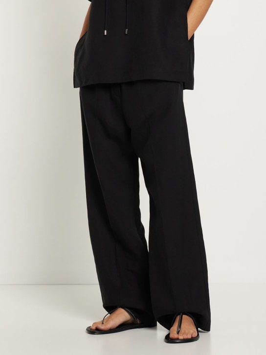 Toteme: 10mm T-strap leather thong sandals - Black - women_1 | Luisa Via Roma